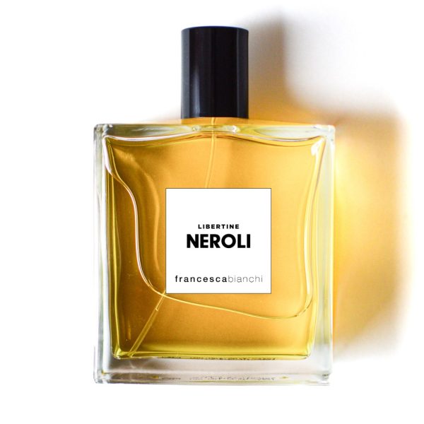 Frasco de Libertine Neroli 100 ml Extrait de Parfum de Francesca Bianchi Perfumes con líquido dorado y tapón negro