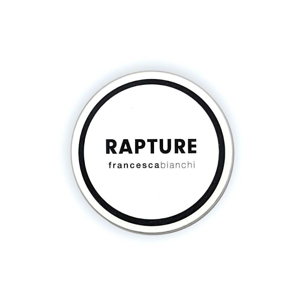 Vista dall'alto del coperchio della candela profumata Rapture 60g di Francesca Bianchi Perfumes con testo nero su sfondo bianco